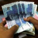 Rupee hits one-year low against dollar